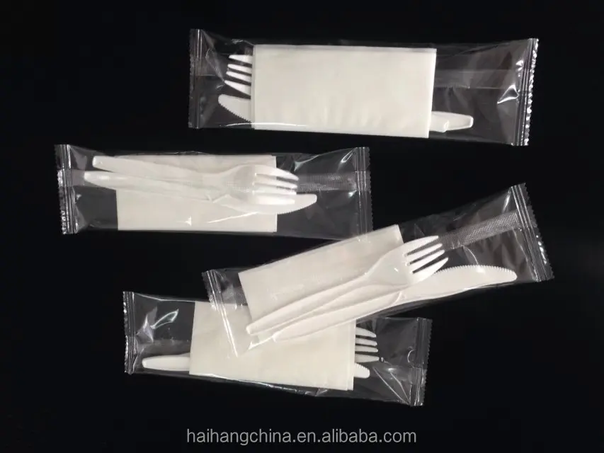 
disposable spoon knife fork auto feed wet wipe/tissue paper making packing machine of Ruian China 
