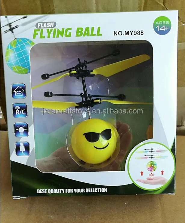 Hot sell induction toys flying ball with light Expression face design sensor flying ball