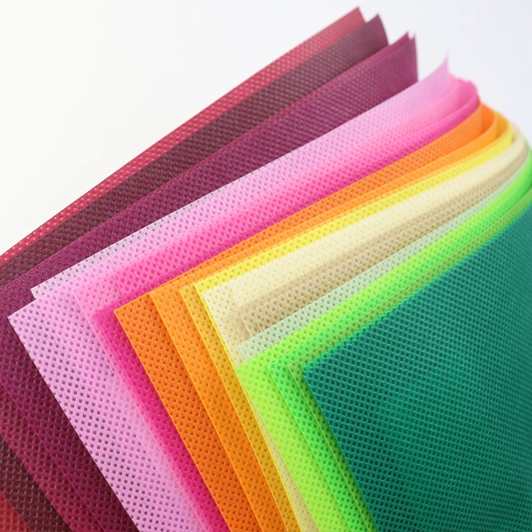 Colorful non woven cloth pp spunbond nonwoven fabric for bags making china manufacturer