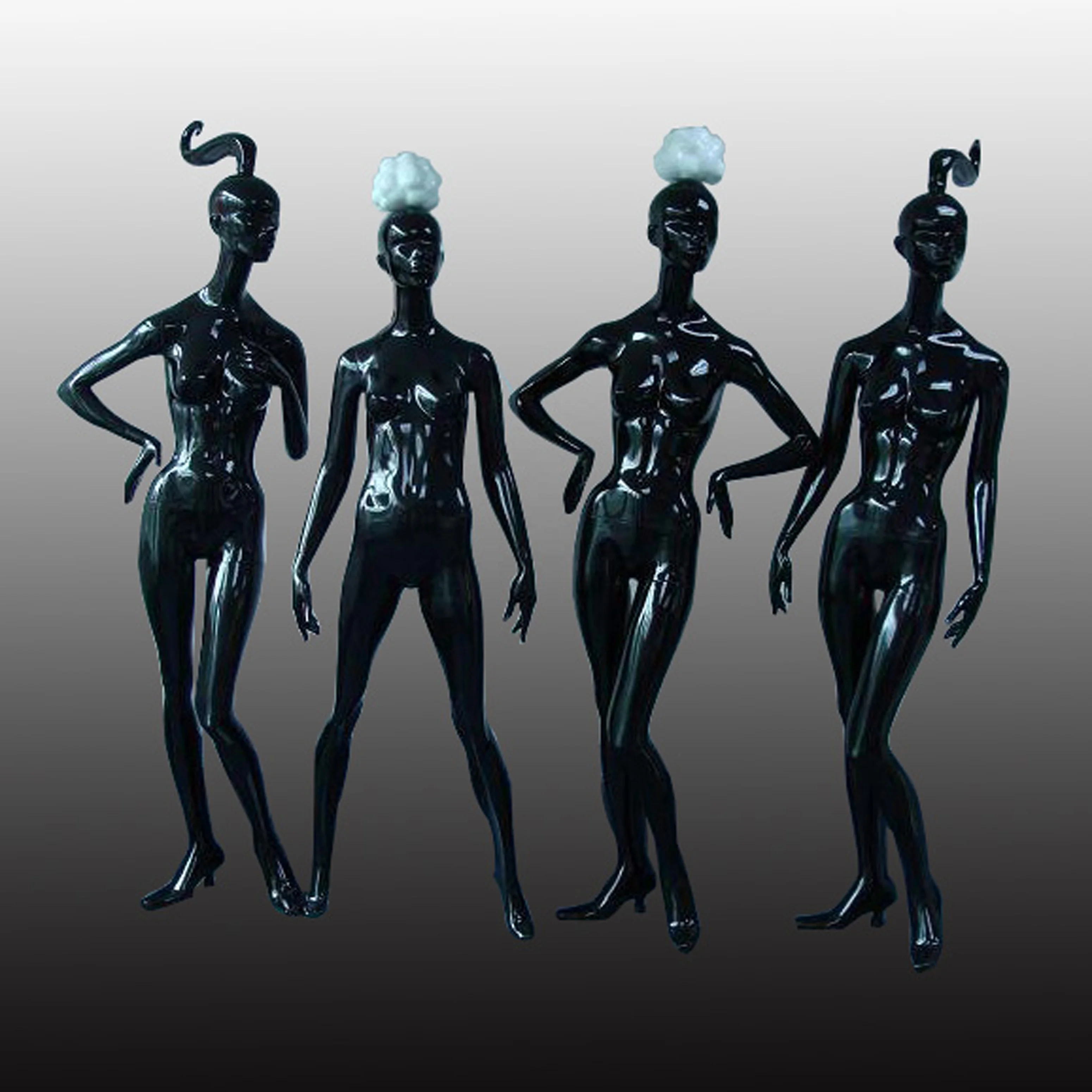 
Abstract glossy black female mannequins 
