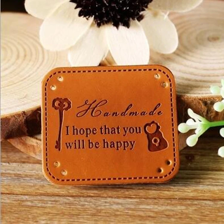 Factory Price Clothing Pattern Embossed Denim jeans Leather Patch Jeans PU Label for jeans