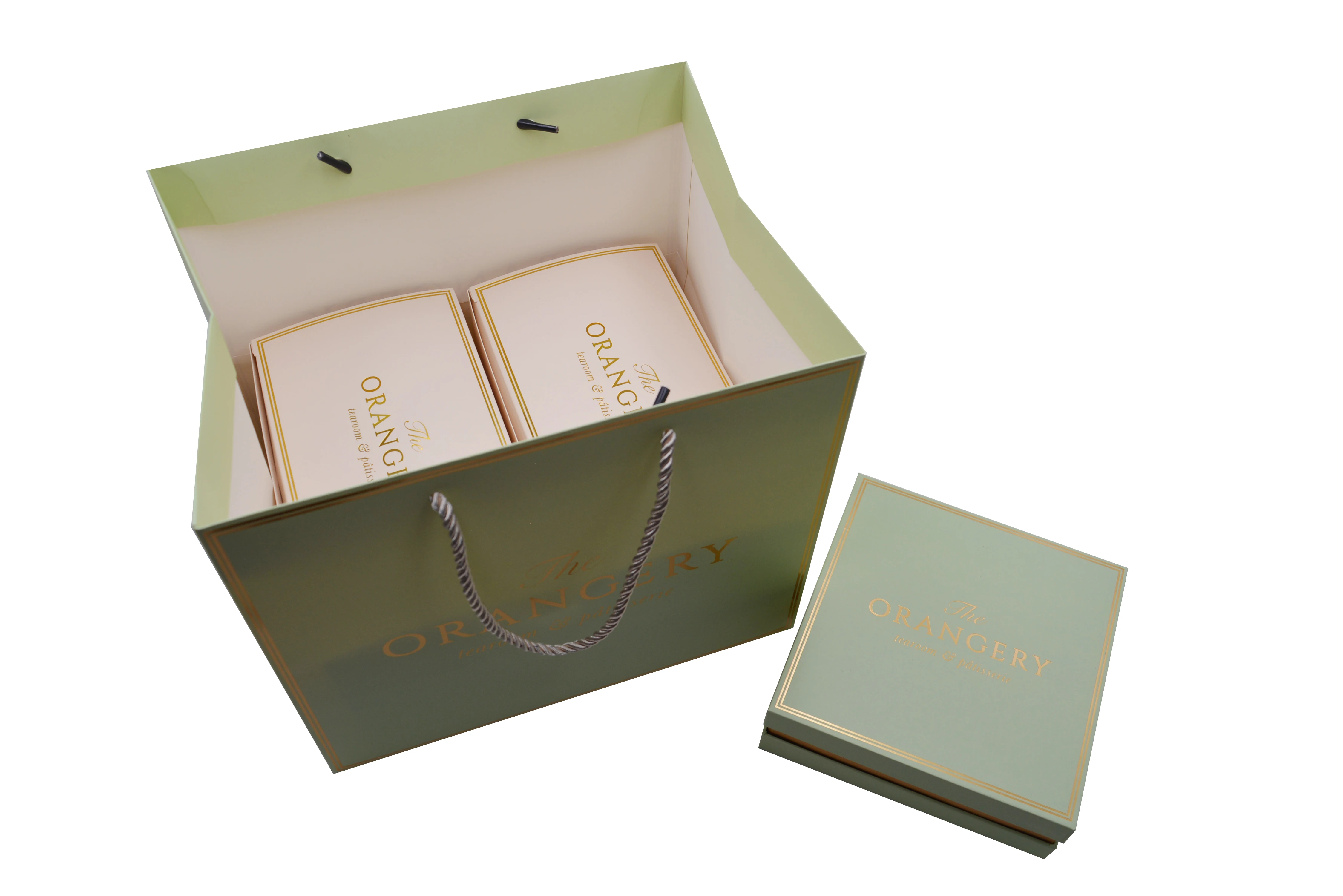 
Luxury golden logo printed shopping paper bag with rope handles for clothing Jade bracelets wooden figures gift packaging bag 