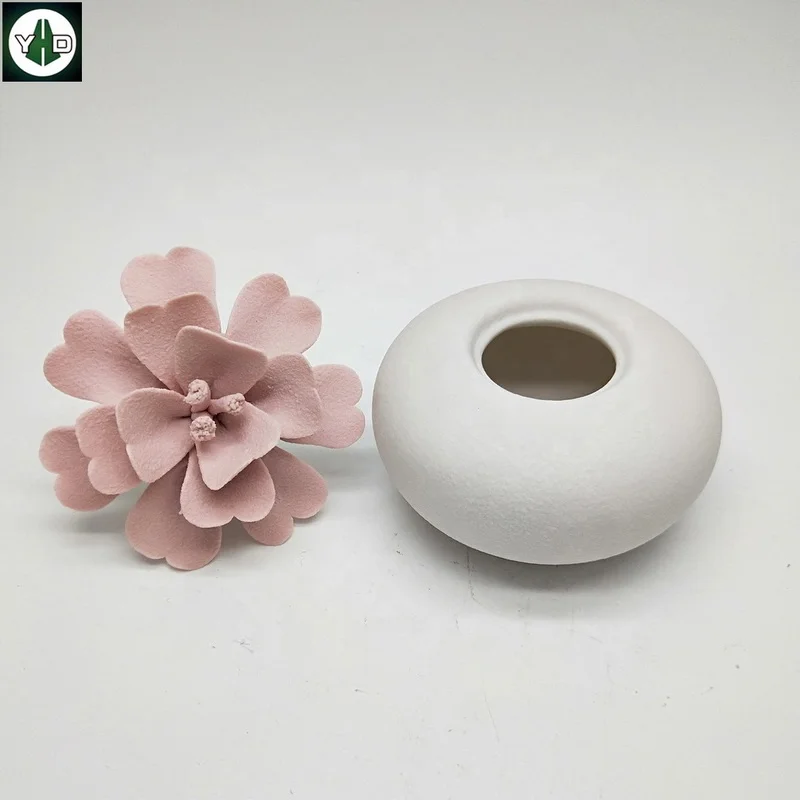 Eco-friendly Handmade matte pink  flower ceramic  aroma oil diffuser Ceramic Aromatherapy Bottle Car Fragrance Air Purification