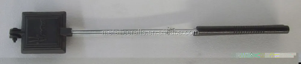 
heavy cast iron fireside pie iron with stay-cool wooden handles 