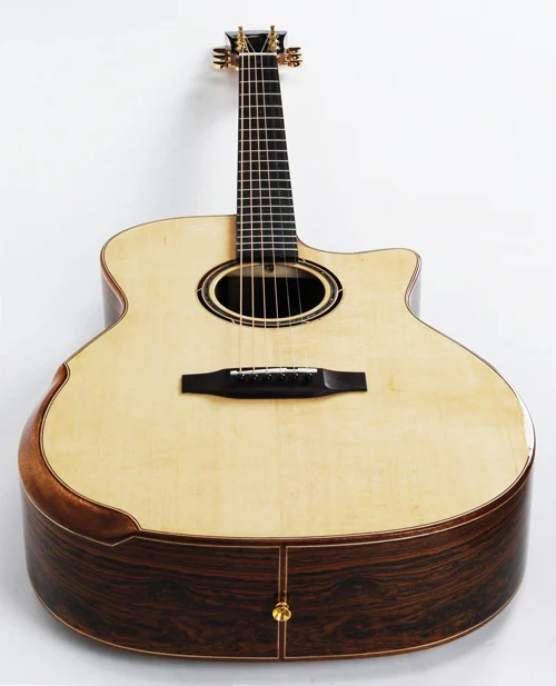 
41 inch solid Sitka spruce acoustic guitar 