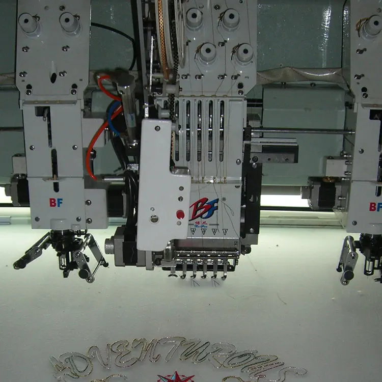 Industrial computerized embroidery machine with accessories