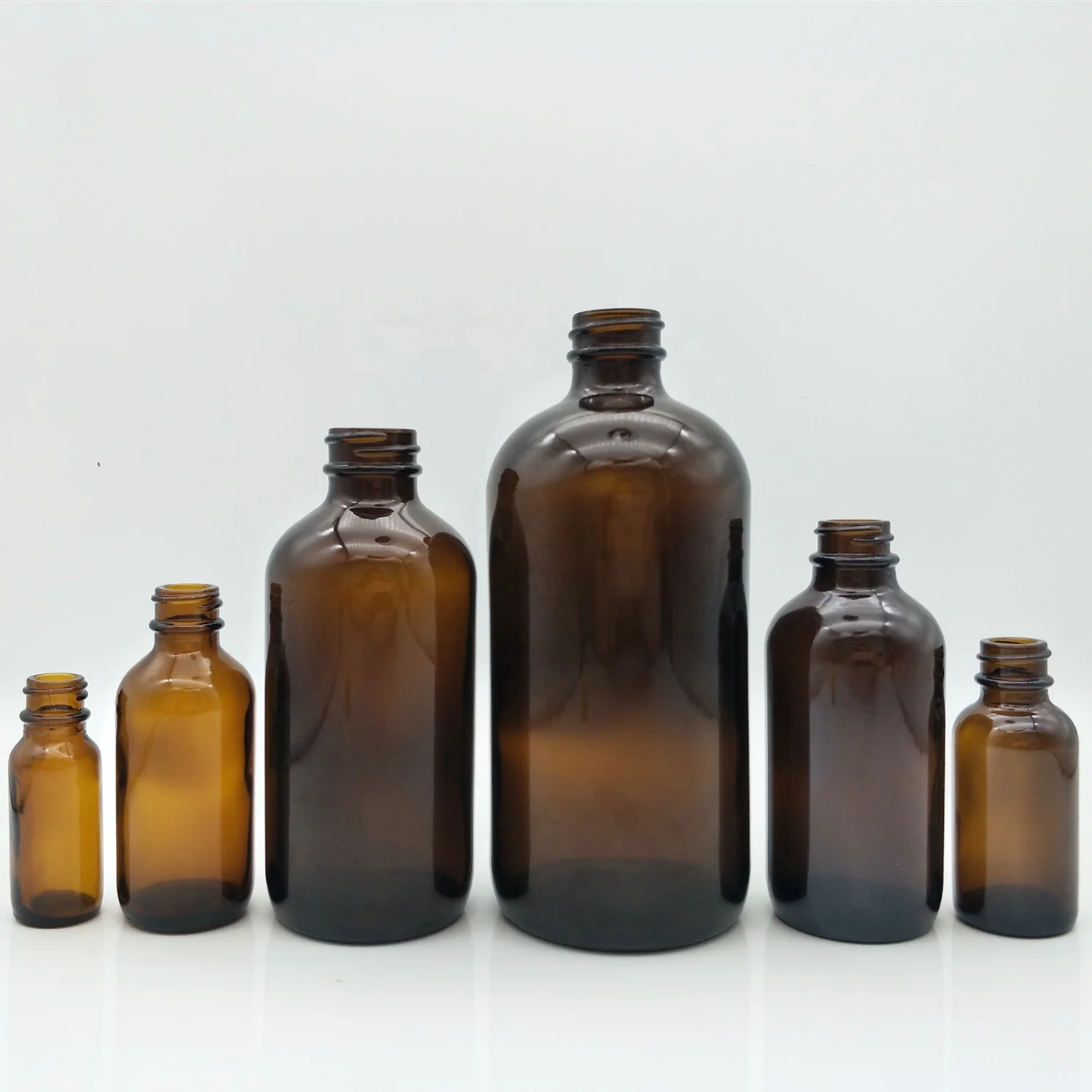 Hotsale factory direct supply 8OZ 250ml clear amber boston round  glass bottle