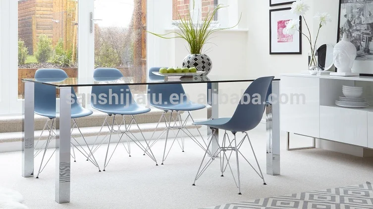 
Tempered glass dining table with stainless steel stand for sale 