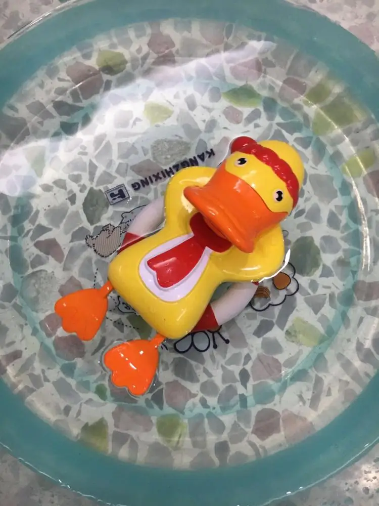 Wind up toy duck for baby bath toys play in water