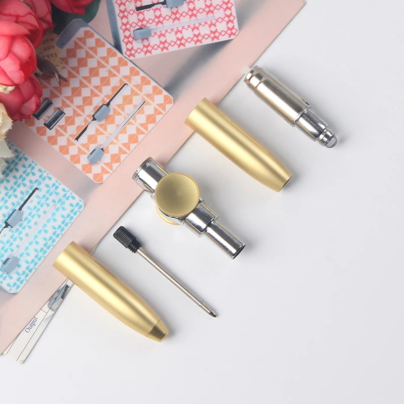 newst design hand spinner pen metal ballpoint pen with light/rotating pens