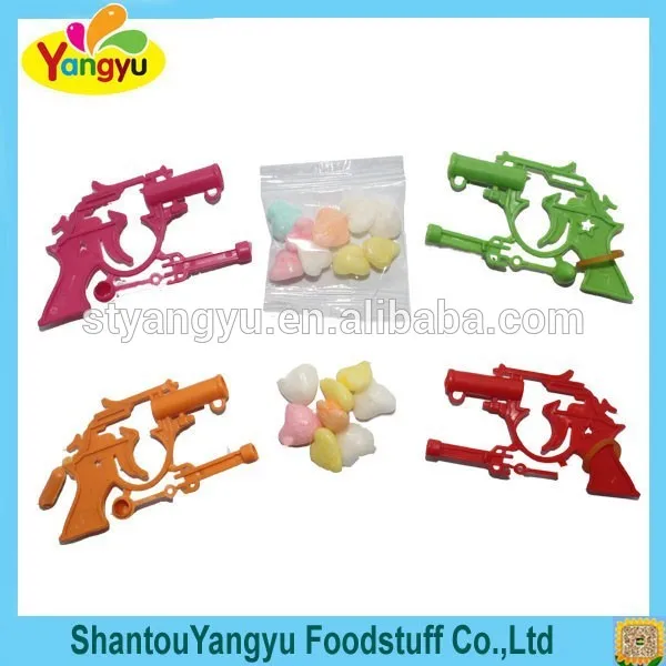 маленькой смешной пистолет игрушка конфеты