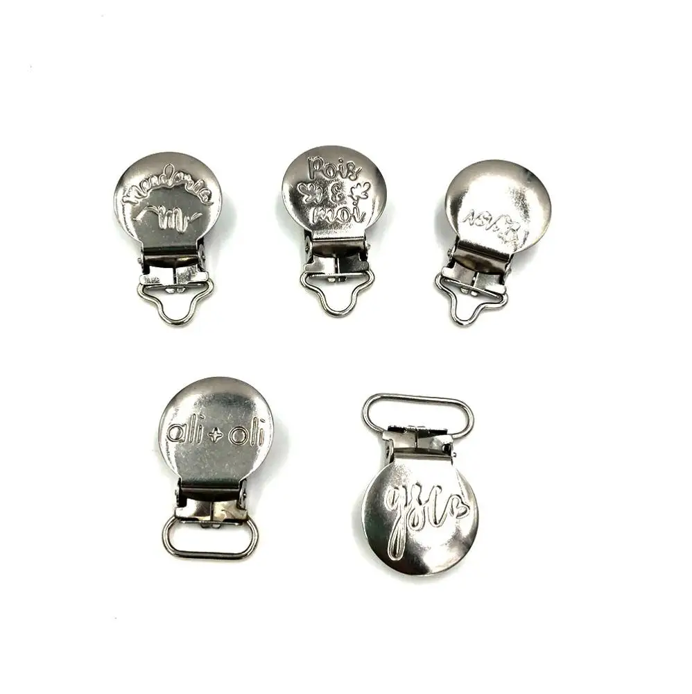 Factory custom design stainless steel baby pacifier clips for ribbon