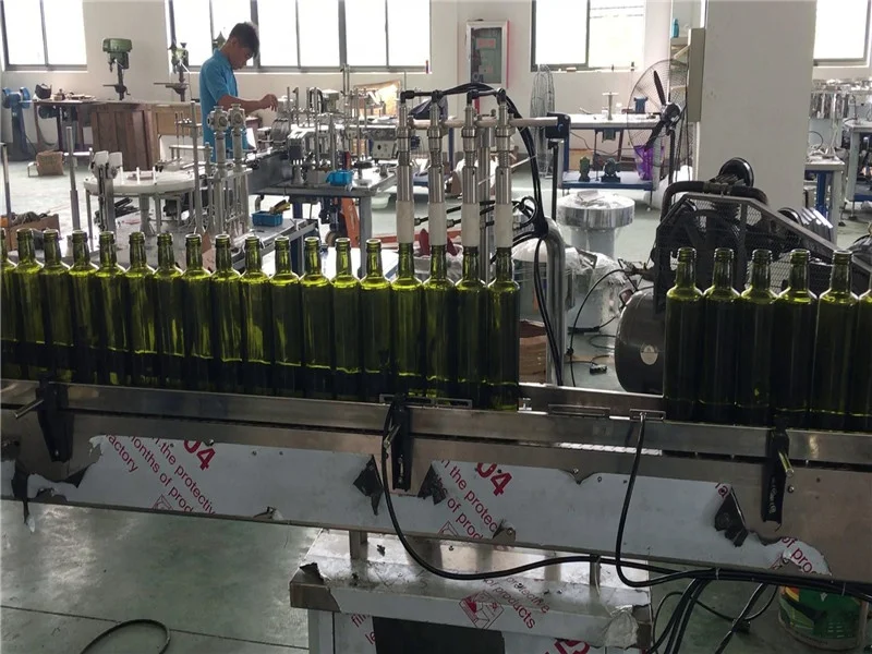 Lemon Oil Filling Capping Machine With Labeling  Coconut oil filling machine With Four head
