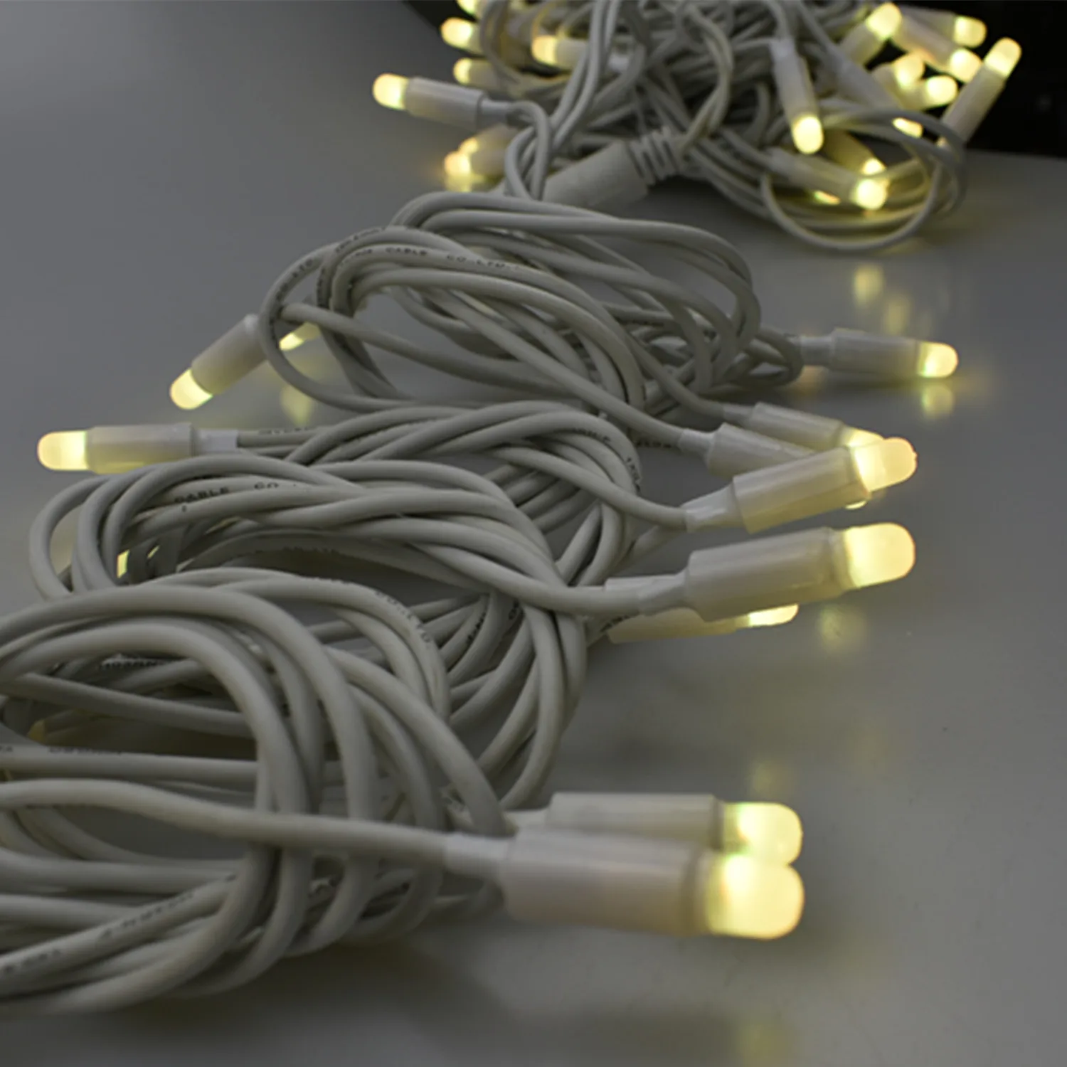 Smart Pixel Light RGB LED String Light 100L Rubber Cable Capsule Bulb IP 66 Chain Light for Commercial Outdoor Application