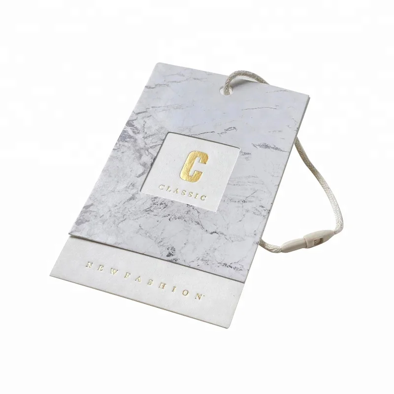 
Low MOQ custom brand design hot golden foil stamping own logo white cardboard marbling printing hollow out hang tag for clothing 
