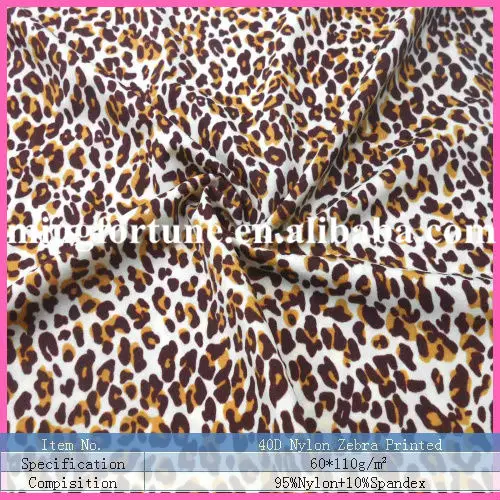 
White and yellow leopard printed metallic lycra fabrics 