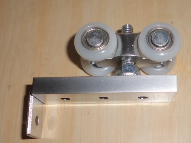 Sliding door hanger rollers for wooden door