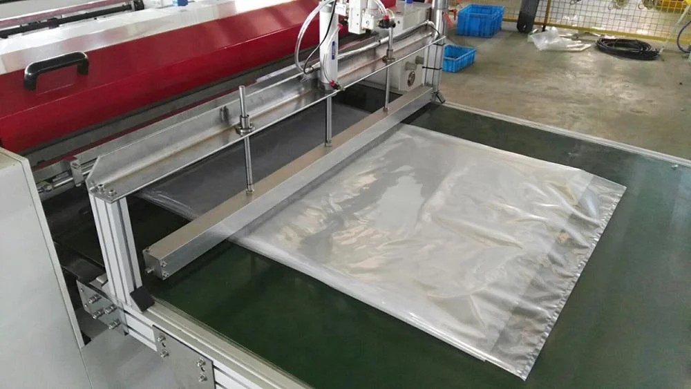 2 line LDPE plastic baging machine to make heavy duty Medical garbage bag by fly knife bottom seal cutting bag making equipment