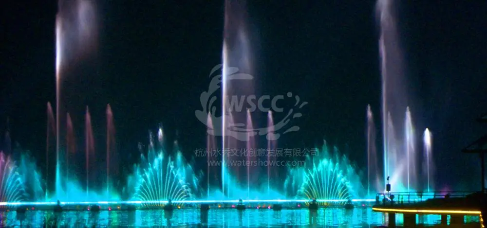 Outdoor water show dancing music fountain show in the lake or in the pool