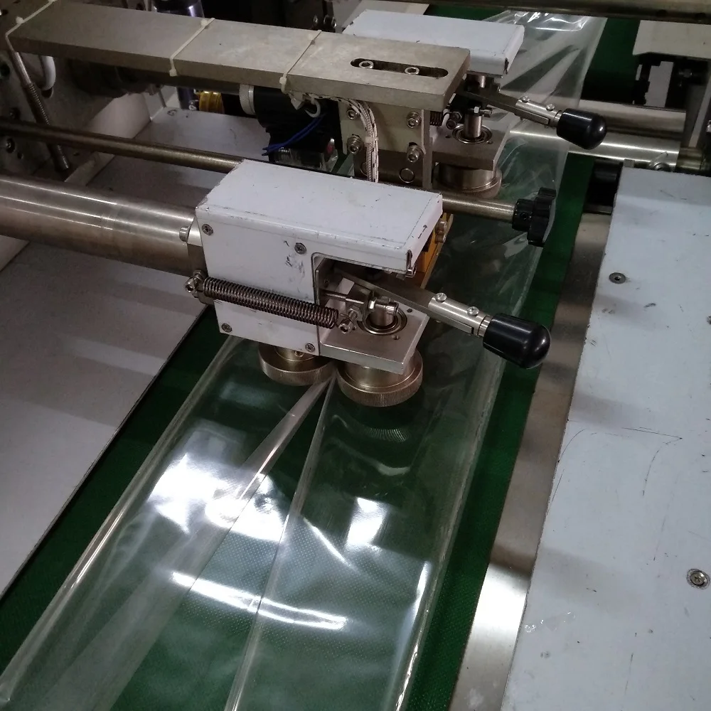 Automatic low cost plastic pouch book / a4 paper packing machine