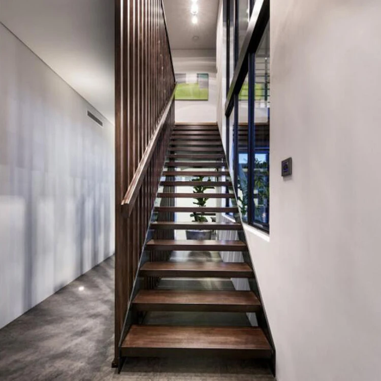 Hard wood steps and tempered glass railing Interior Steel wood staircase