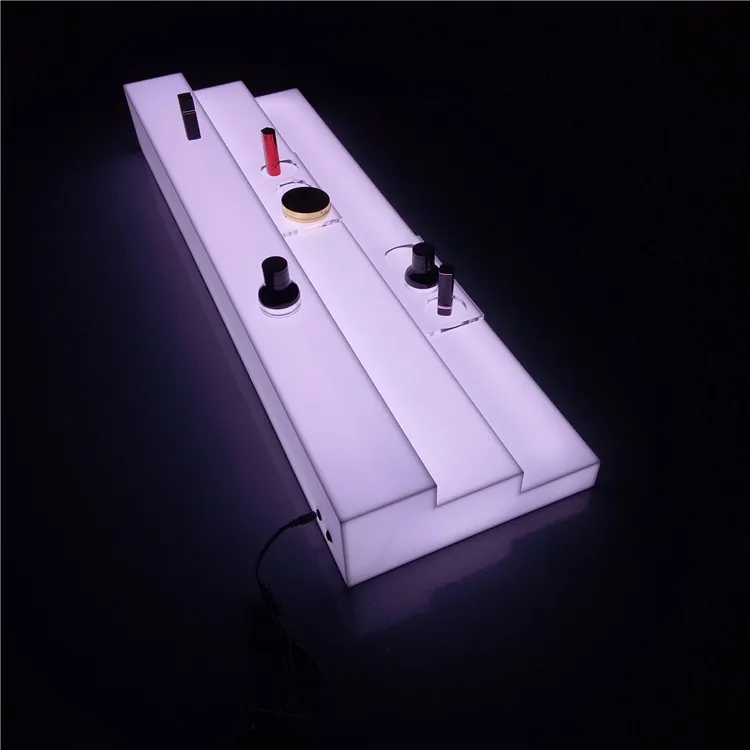 
illuminated led light acrylic display riser stand for cosmetic, lipstick, lip gloss, eyeliner,eyelash, perfume, nail polish 