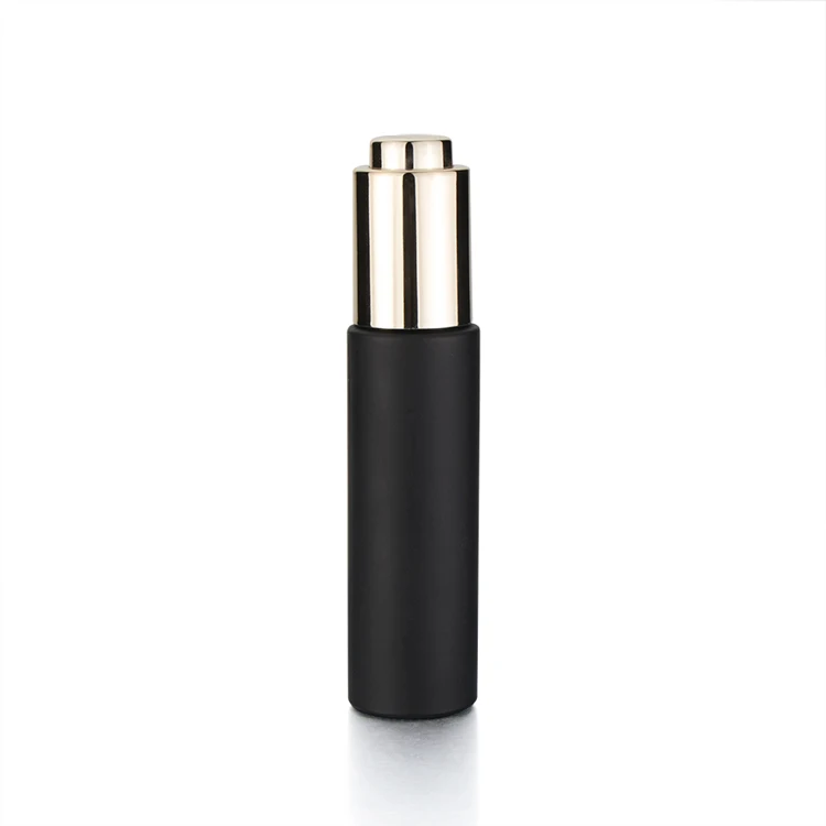 
Fancy label 30ml push button pump black thick cylinder glass cosmetic dropper packaging bottle with dropper or press pump 