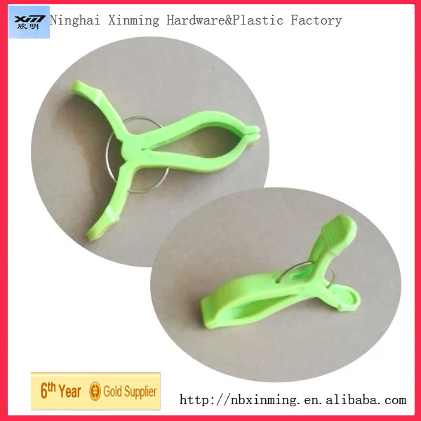 Round plastic clothes peg with hook