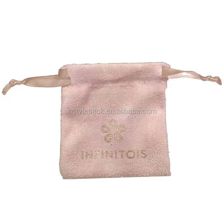 small pink velvet jewelry pouch with tassel drawstring