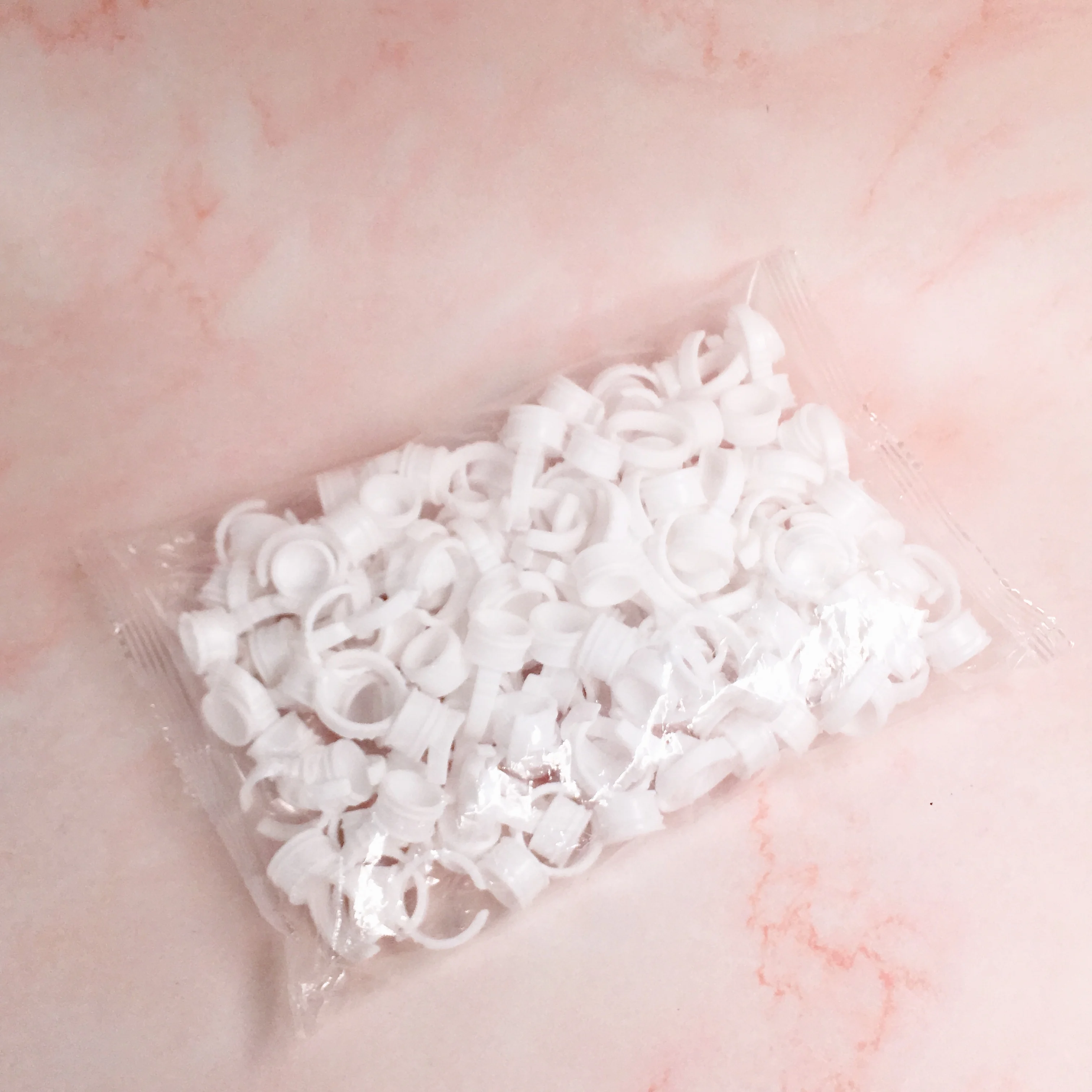 Wholesale Eyelash adhesive holder 100 pcs/pack Plastic Disposable Eyelash Extension Glue Plastic Eyelash Glue Rings