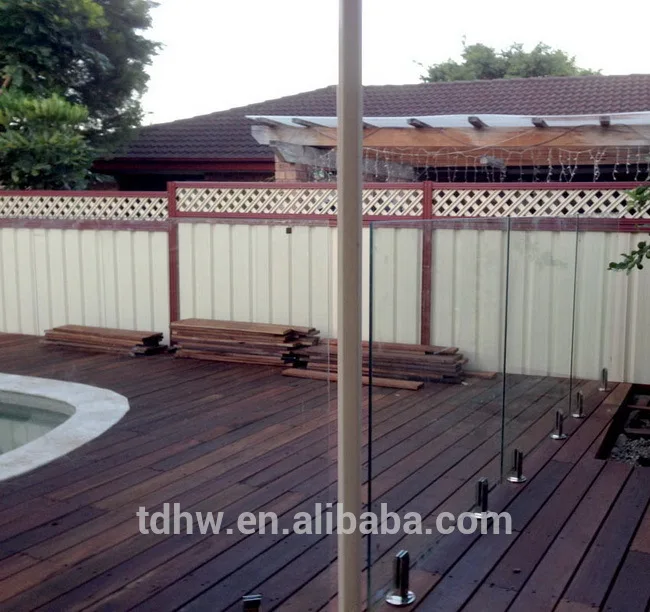 Glass balustrade with S.S mini post bolted down into the Hardwood Timber Deck