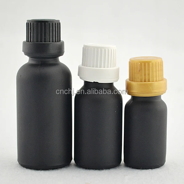 black glass boston round bottles with dripolator plug tamper proof evident cap glass bottle for essential oil orifice reducer