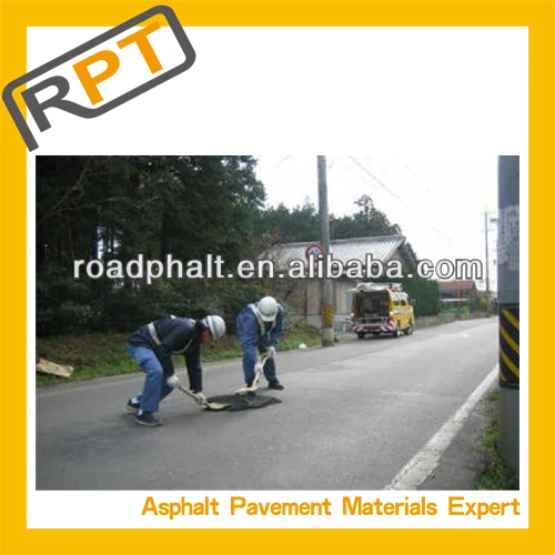 repair road loose in winter cold asphalt