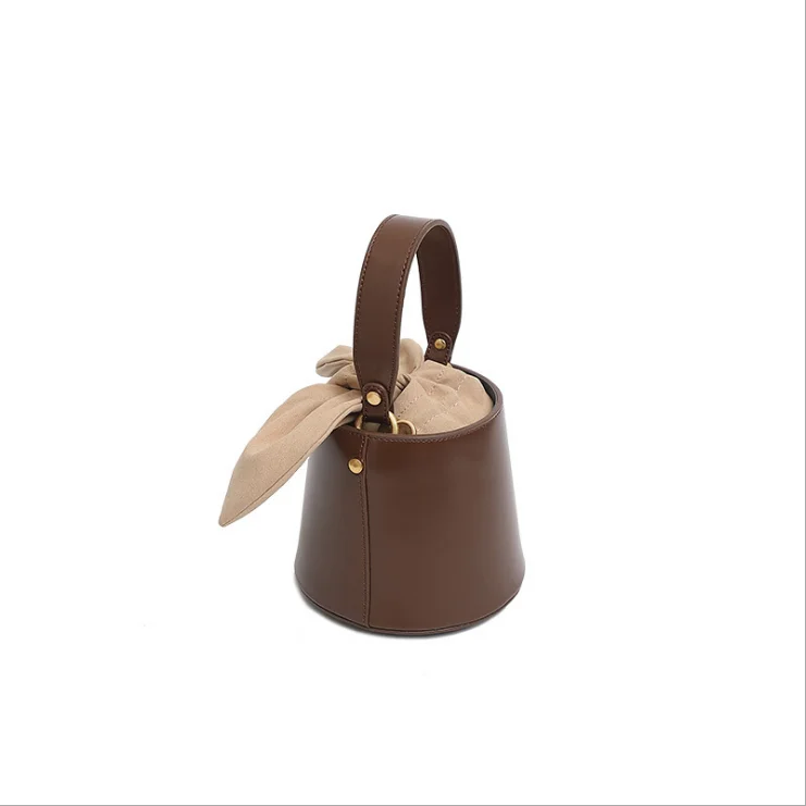 Niche design leather handbag bucket bag female 2019 new bow shoulder slung mobile handbag