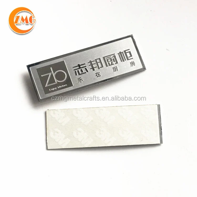 best selling cheap high quality shiny gold finished and white printed small rectangle adhesive metal tag