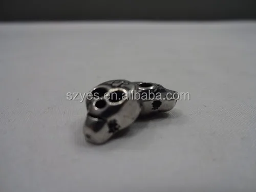 wholesale cool skull shape metal rivet with PP logo for garment