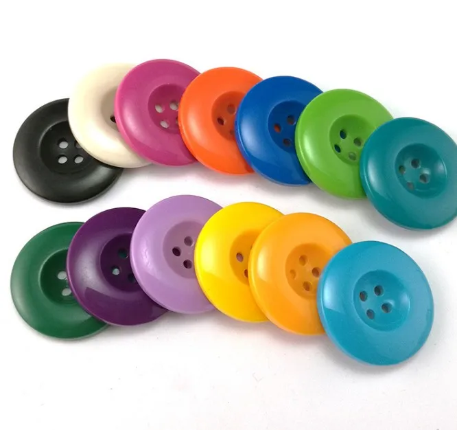 4 hole round debossed soft rubber clothing button