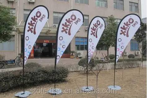 
Flying Style and Fiberglass Flagpole outside beach flags 