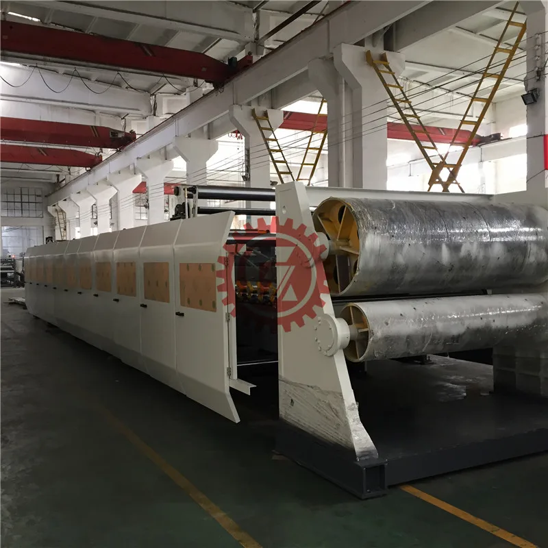 Машина для производства картонных коробок с двойным излучением