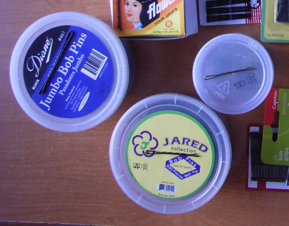 Заколки-невидимки для волос в пластиковой круглой коробке