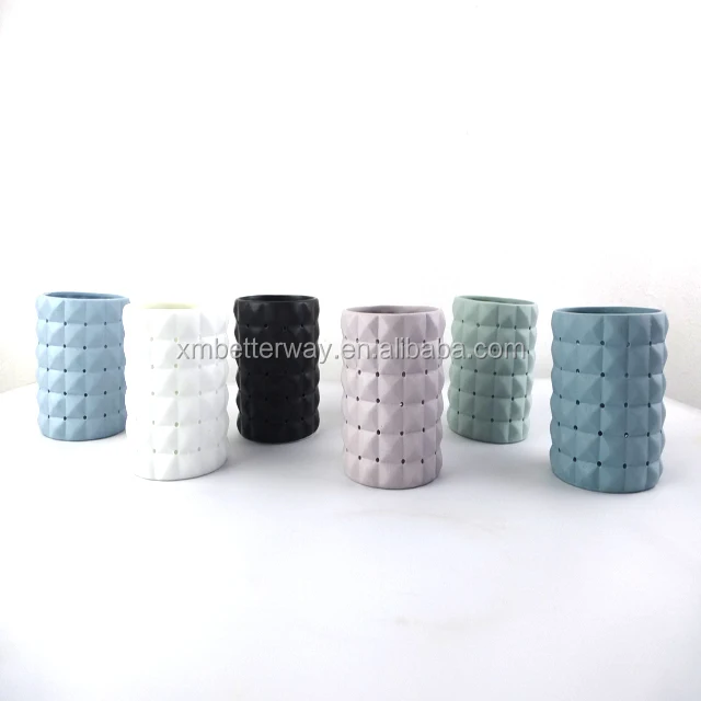 geometric ceramic candle container
