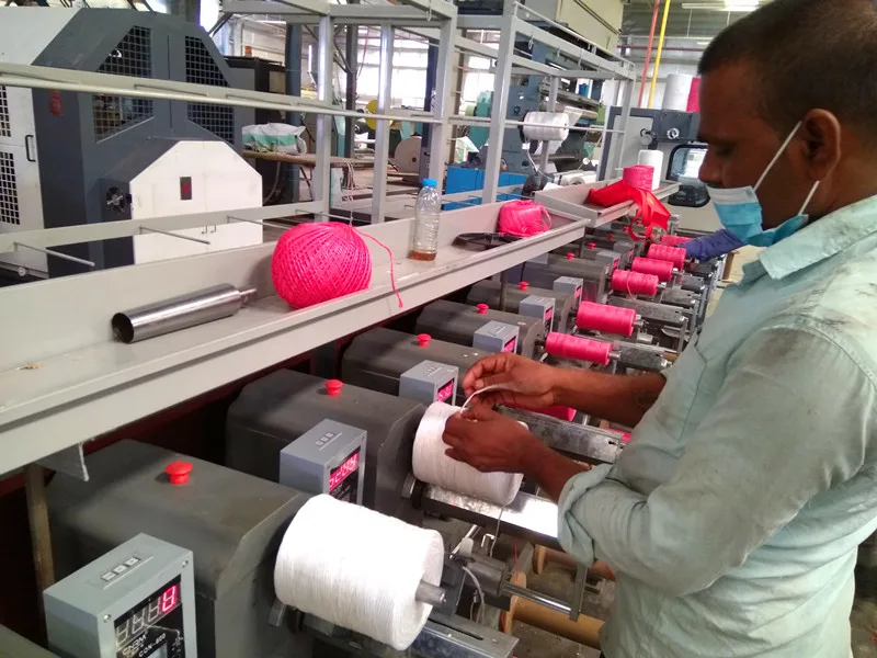 Cylindrical and conical tube bobbin type thread winder machine for raffia multifilament and nature fibres packages