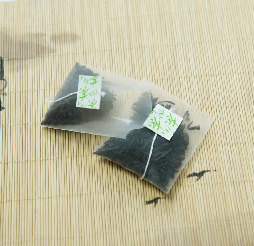 Nylon Empty Pyramid Tea Bag Custom Own Logo Seal Filter For Herb Tea