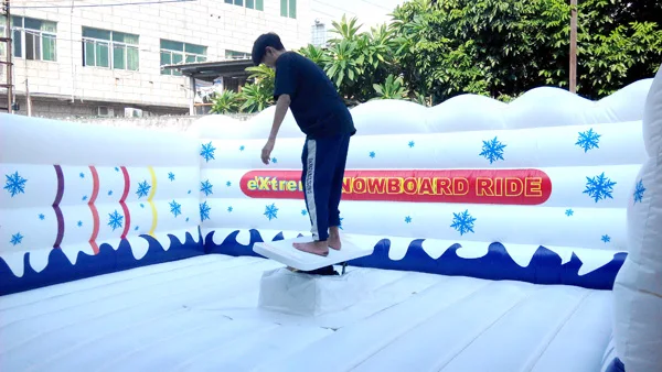 Wholesale Cheap Price Surf Simulator Rides Game Inflatable Mechanical Snowboard Rides With White Mat