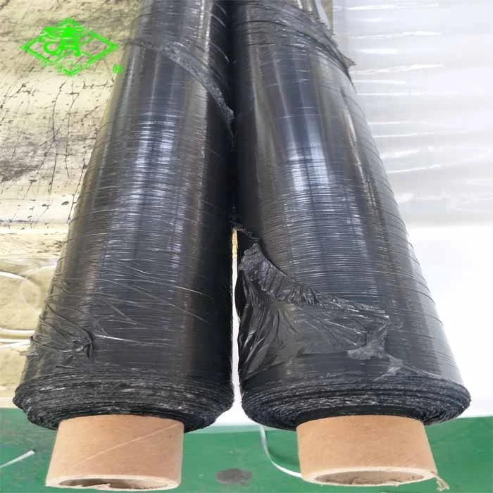 Black plastic ground cover/ weed control mulch layer