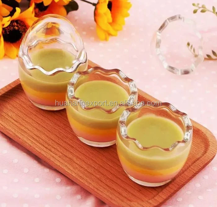 New design 85ml 100ml 200ml funny egg shaped glass jar for pudding with lid / egg shell shaped pudding glass jars candy jars