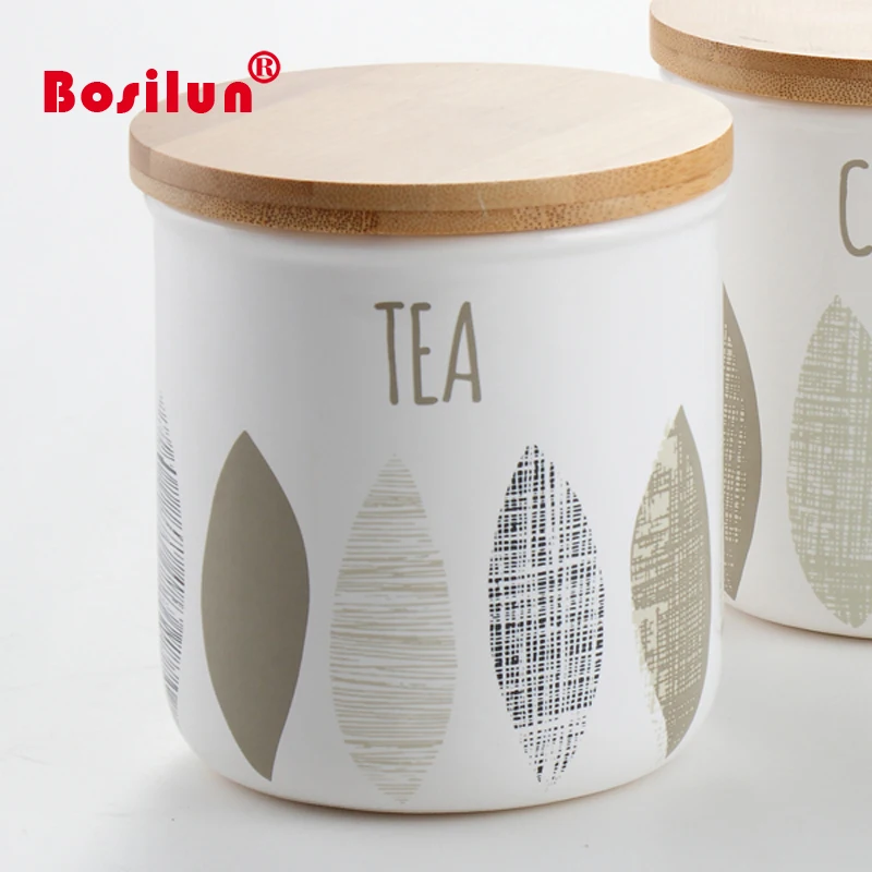 White decaled ceramic canisters set with bamboo lid 3pcs