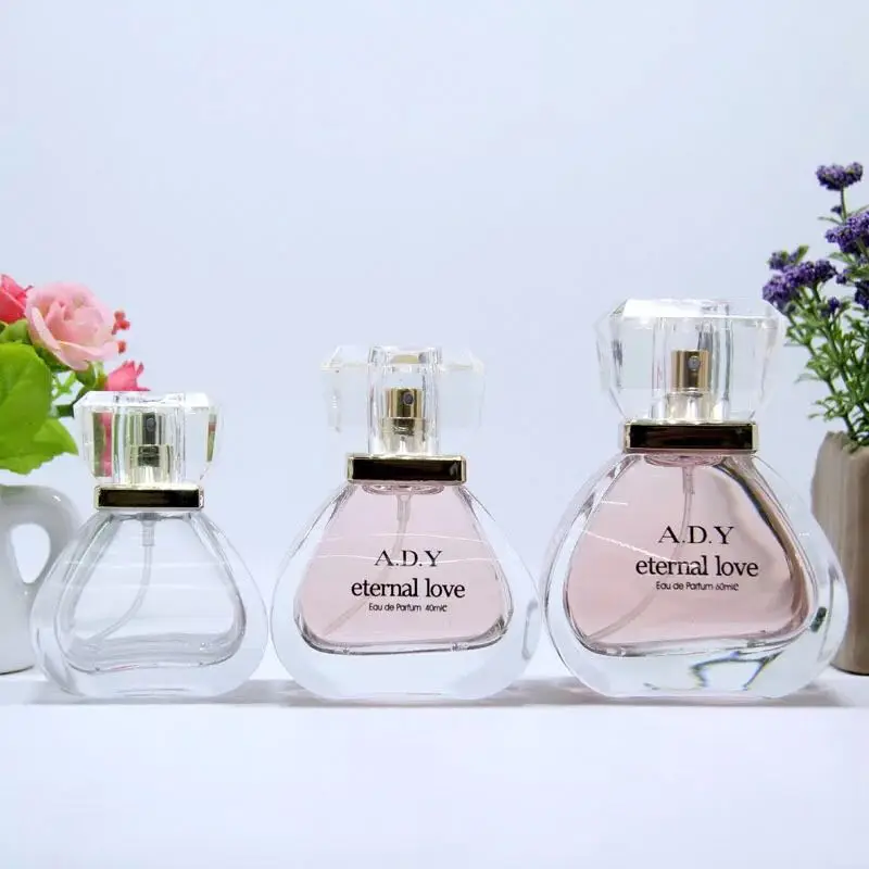 
30ml.50ml.100ml triangle shape glass spray perfume bottle made in china 