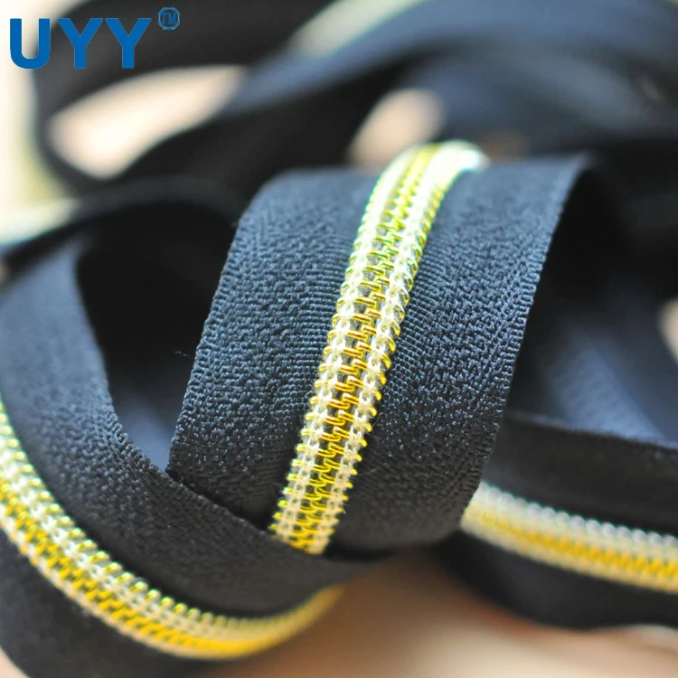 UYY Custom 3# nylon zipper roll long chain gold teeth nylon zippers