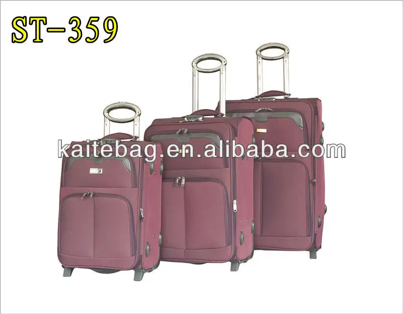 
2012 new design three pieces set purple EVA luggage suitcase on wheels 